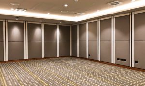 Double Tree Hilton - Custom Upholstered Foam Wall Panels in Commercial Fabric width=