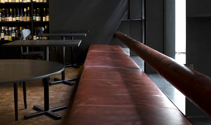 Petition Wine Bar - Upholstered 10 Meter Long Custom Made Bench Seat with a Floating Bolster Backrest. Double Stitching detail used throughout the joins and borders of the seat