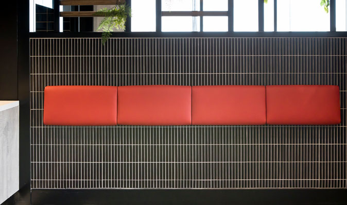 KFC Murdoch - Upholstery of Lean Bar fixed to the wall with Instyle Zone Red Vinyl